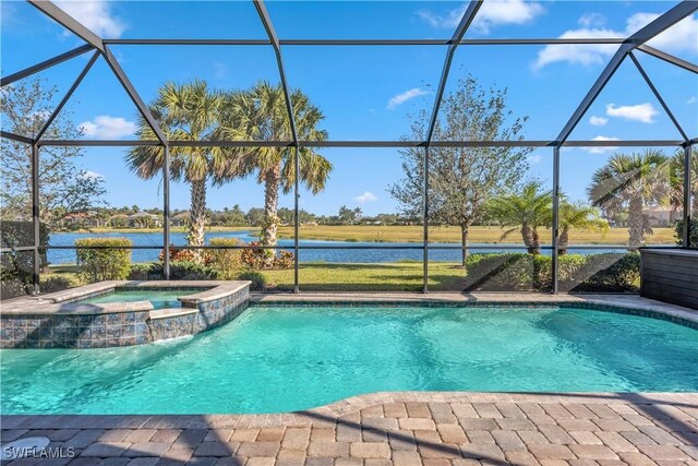 view of pool featuring a water view, an in ground hot tub, and glass enclosure