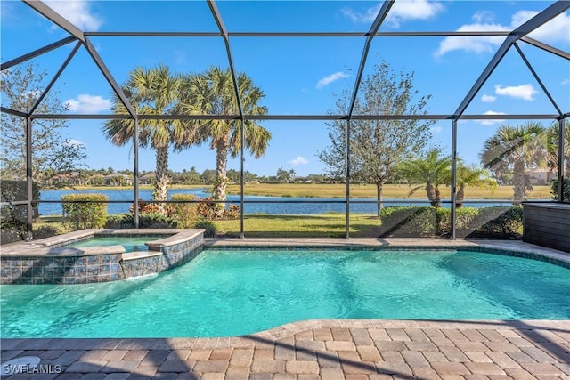 view of pool with a patio, a water view, a pool with connected hot tub, and a lanai
