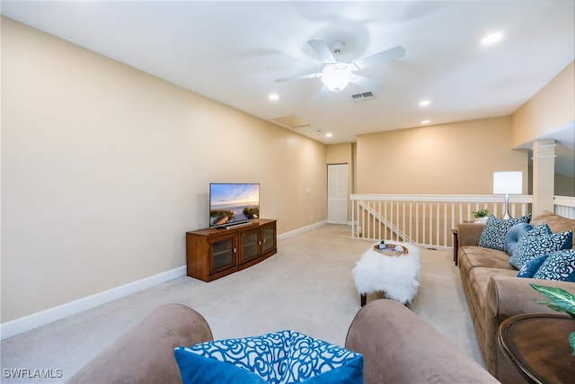 living room featuring visible vents, recessed lighting, light colored carpet, and baseboards