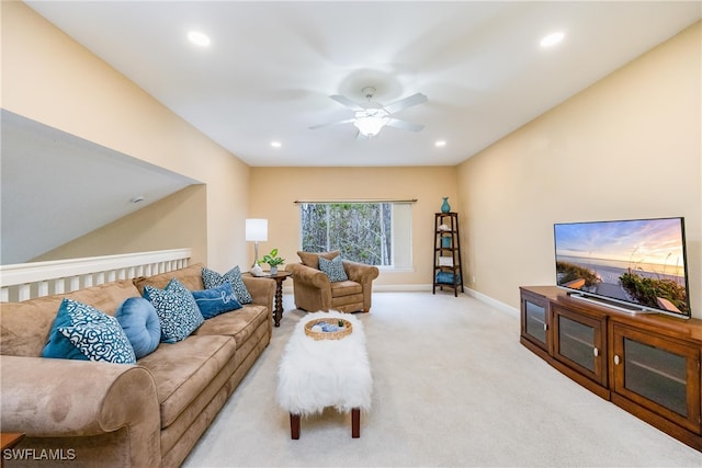 living area featuring recessed lighting, baseboards, a ceiling fan, and light colored carpet