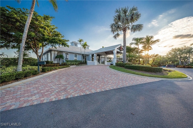 view of front of home featuring decorative driveway