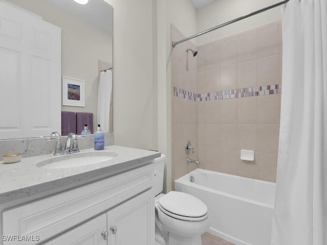 full bathroom featuring vanity, toilet, and shower / bath combo with shower curtain