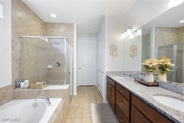 bathroom with vanity, tile patterned floors, and separate shower and tub