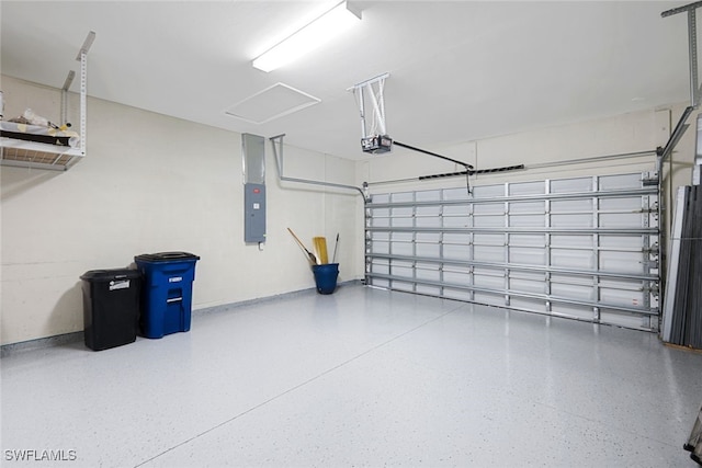 garage with a garage door opener and electric panel