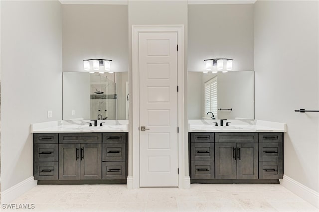 bathroom with vanity, an enclosed shower, and tile patterned floors