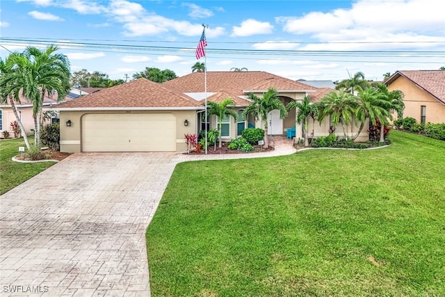 view of front of house featuring a garage and a front yard