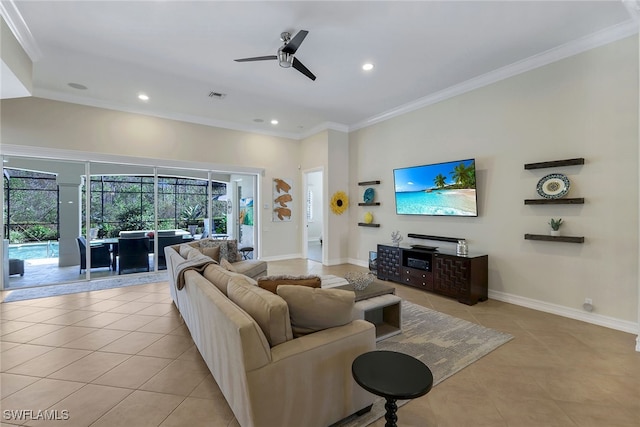 living room featuring ceiling fan, light tile patterned floors, and ornamental molding