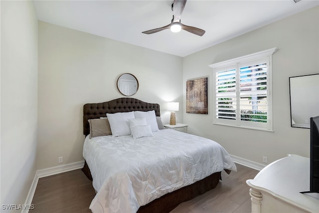 bedroom featuring hardwood / wood-style floors and ceiling fan