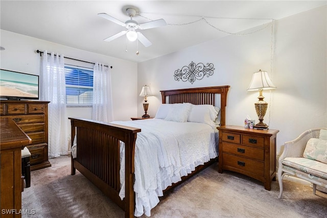 bedroom featuring ceiling fan and carpet floors