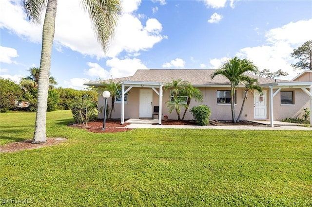 view of front of property with a front yard