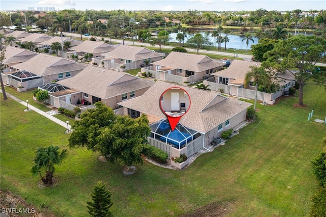 drone / aerial view featuring a water view