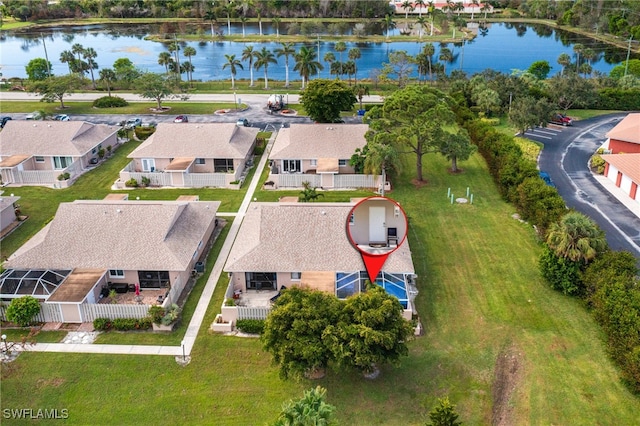 drone / aerial view with a water view