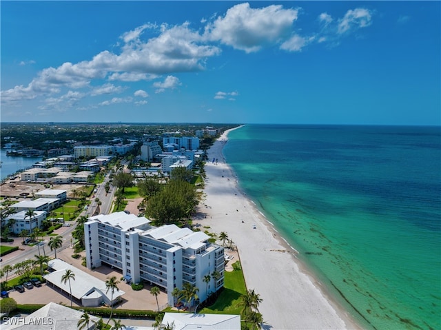 aerial view featuring a view of the beach and a water view