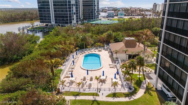 birds eye view of property with a water view