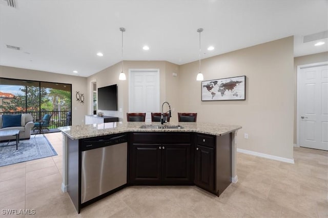 kitchen with pendant lighting, sink, a kitchen island with sink, light stone counters, and stainless steel dishwasher