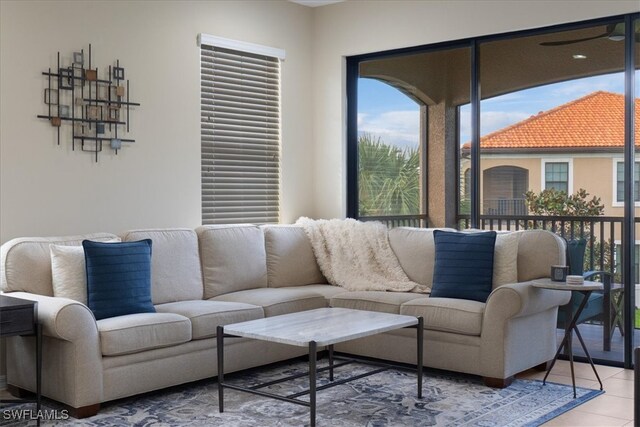 living area featuring tile patterned floors