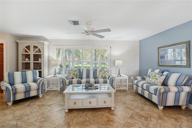 living room featuring ceiling fan