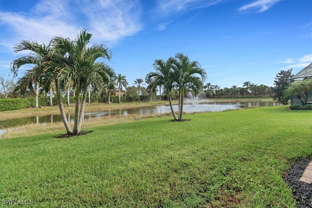 view of yard with a water view