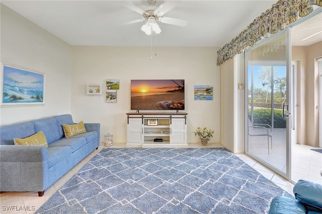 tiled living room featuring ceiling fan