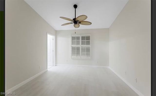 spare room featuring light hardwood / wood-style floors and ceiling fan