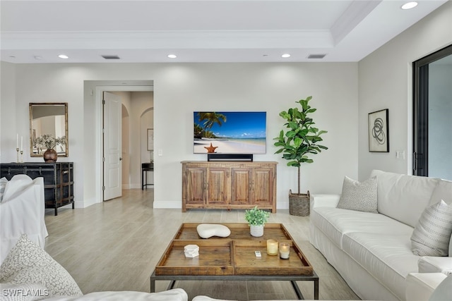 living room with crown molding