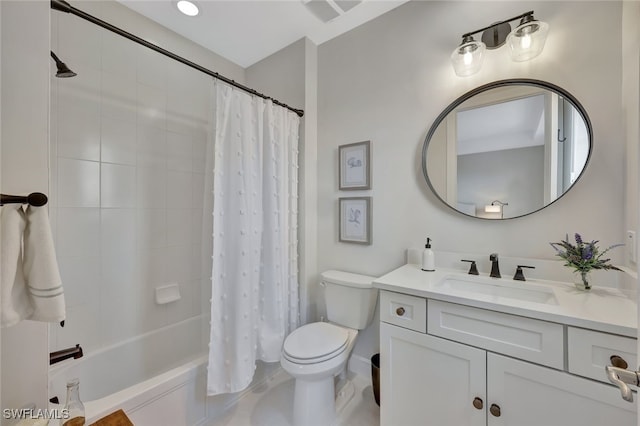 full bathroom with vanity, toilet, and shower / bath combo