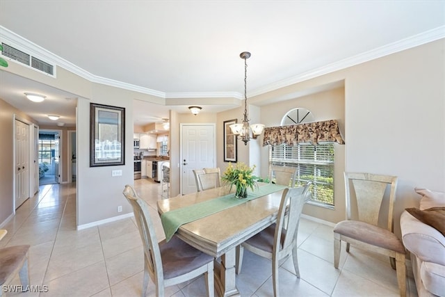 tiled dining area with an inviting chandelier and crown molding