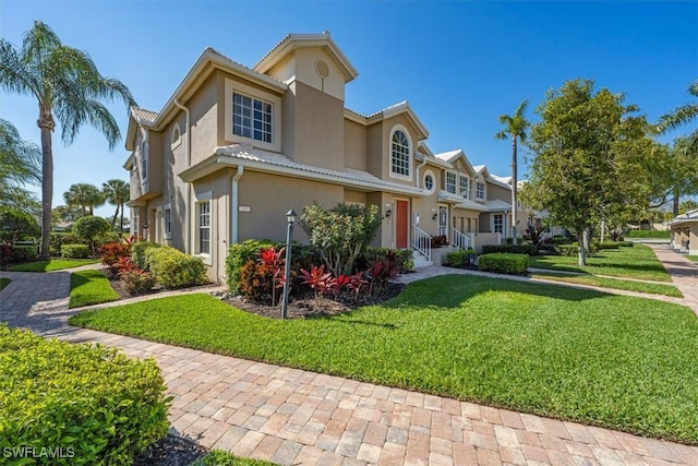 view of front of property with a front yard