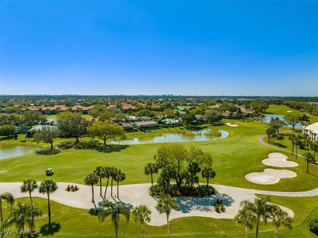 surrounding community with a water view