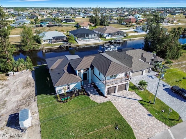 aerial view featuring a water view