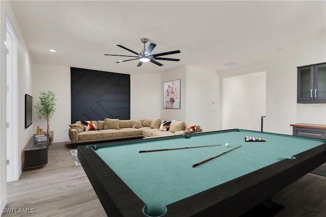 recreation room with hardwood / wood-style flooring, ceiling fan, and pool table