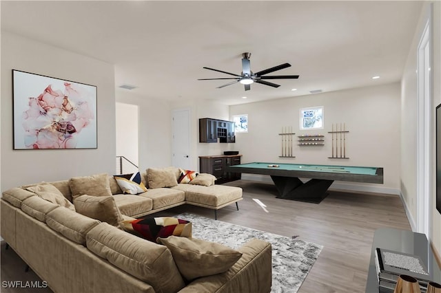 living room with ceiling fan, light hardwood / wood-style floors, and pool table