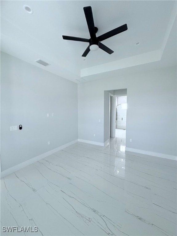 unfurnished room with ceiling fan