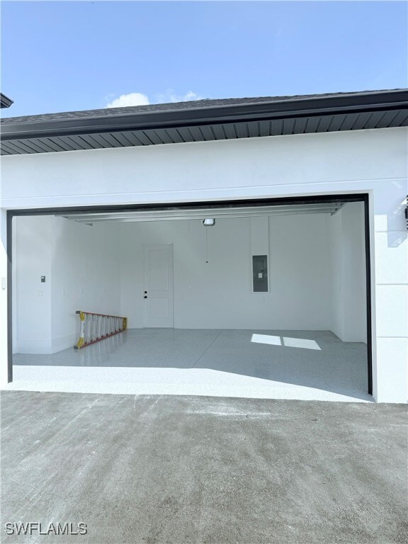 garage with electric panel