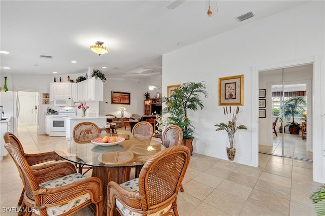 dining space featuring recessed lighting, visible vents, and light tile patterned floors