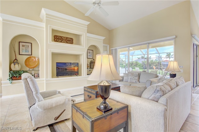 tiled living room featuring lofted ceiling and ceiling fan