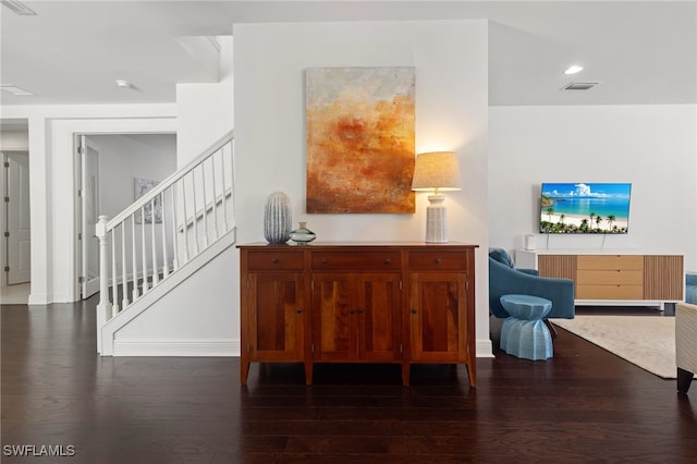 interior space with dark hardwood / wood-style flooring