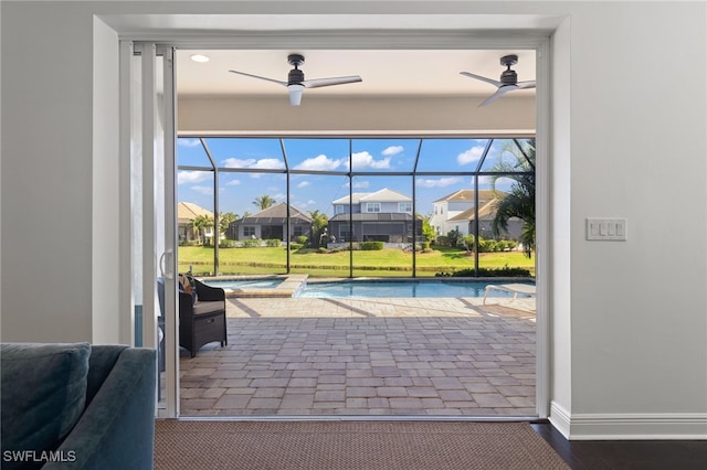 entryway featuring ceiling fan