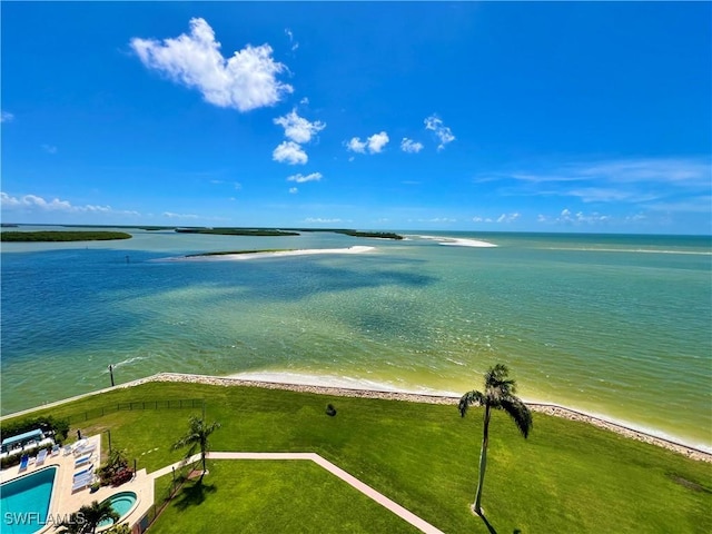 drone / aerial view with a view of the beach and a water view