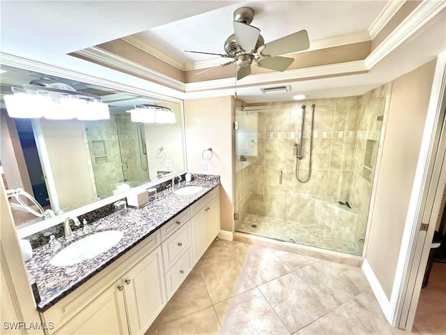 bathroom featuring a raised ceiling, ceiling fan, an enclosed shower, and ornamental molding