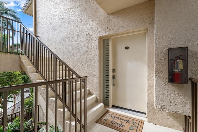 651 10th Ave S Unit C-651, Naples, FL 34102 - property entrance with stucco siding