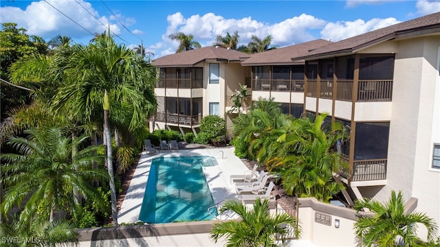 view of swimming pool featuring a patio