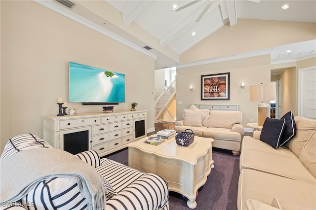 carpeted living room with lofted ceiling with beams