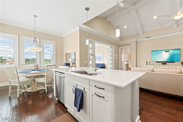 kitchen with a center island with sink, sink, vaulted ceiling with beams, pendant lighting, and dark hardwood / wood-style flooring