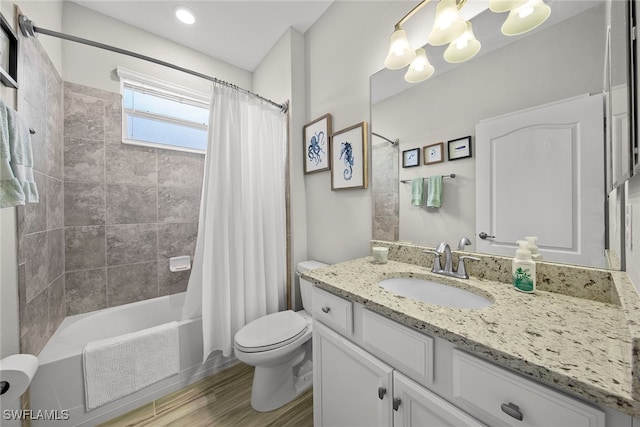 full bathroom with vanity, shower / bath combination with curtain, wood-type flooring, and toilet