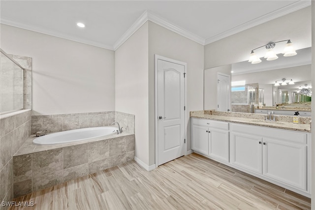 bathroom with vanity, ornamental molding, separate shower and tub, and wood-type flooring