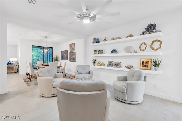 living room featuring ceiling fan