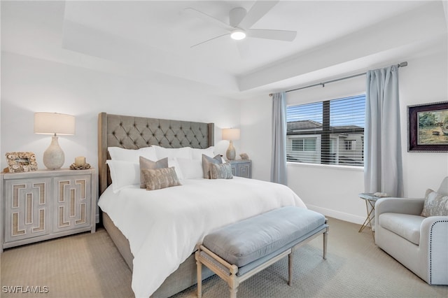 bedroom with light carpet and ceiling fan