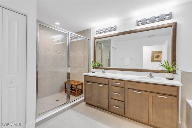 26506 Bonita Fairways Blvd, Bonita Springs, FL 34135 - full bath featuring a shower stall, double vanity, and tile patterned floors