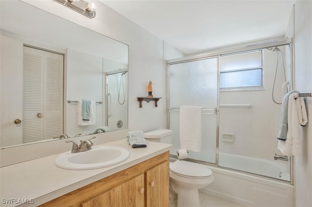 full bathroom featuring vanity, toilet, and enclosed tub / shower combo